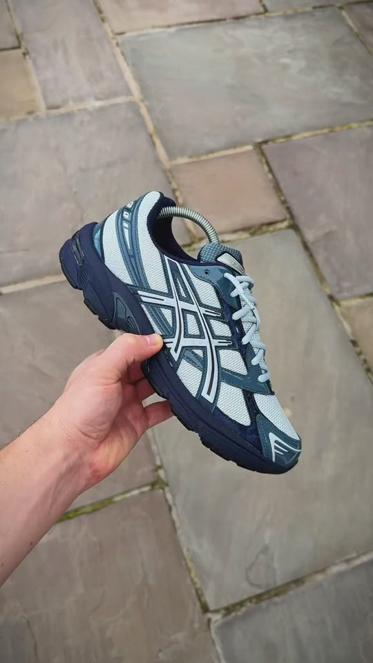 ASICS trainers in navy and light blue